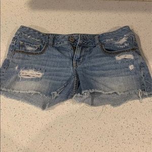 American eagle distressed jean shorts with jewel accent pockets